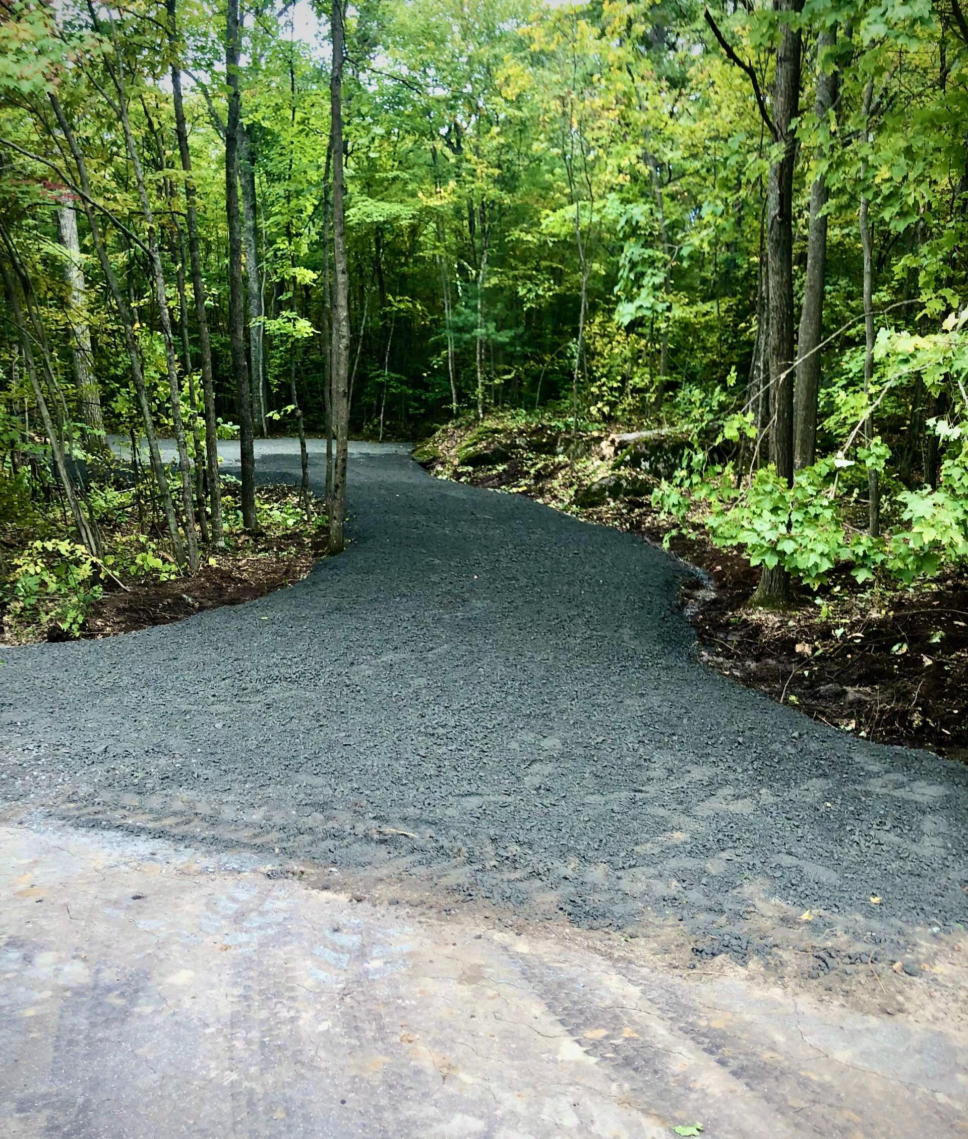 Gravel driveway prep and grading for residential property in Waterloo