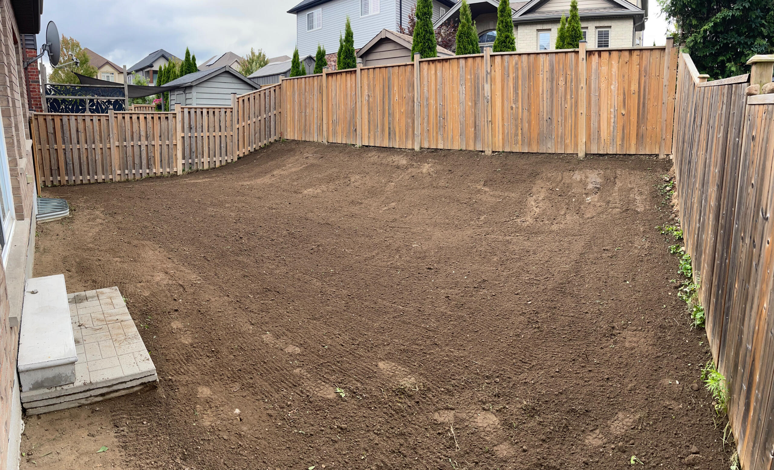 Backyard landscaping and sod installation in Kitchener, Ontario